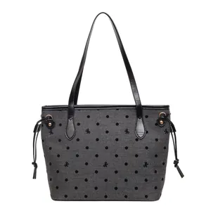 Grey canvas tote bag with black flocked polka dots and embroidery for women