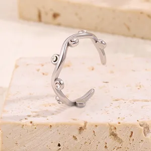 Macro shot of silver titanium vine ring with sparkling cubic zirconia on stone