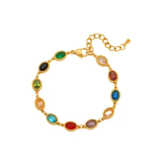 Pulsera dorada de acero inoxidable con once piedras ovaladas de colores y cierre de langosta