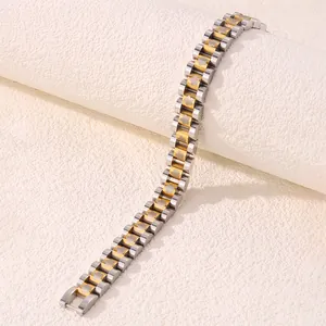 Detail of two-tone stainless steel bracelet with hollow flower link watch strap design