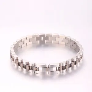 Detailed macro view of silver titanium steel watchband bracelet with floral patterns