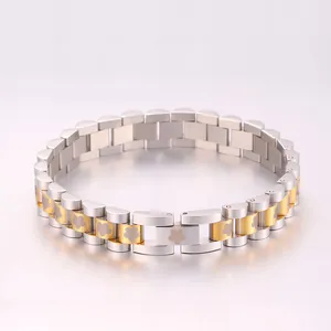 Detailed macro view of two-tone stainless steel bracelet with floral watchband links