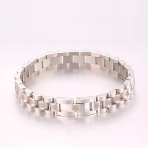 Close-up of titanium steel bracelet featuring watch-band links and flower patterns
