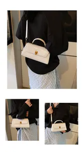 Detailed views of a white glossy leather mini bag featuring a gold twist lock and strap