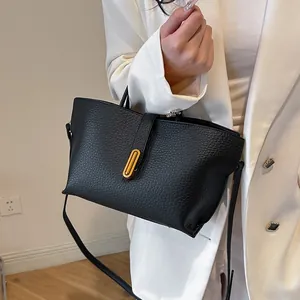 Large black lychee pattern leather tote bag with gold metal buckle for women