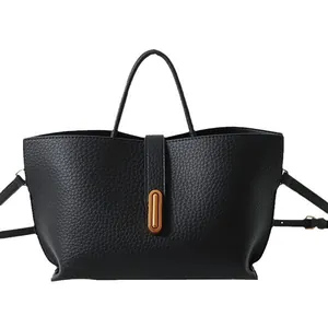 Large black litchi texture leather tote bag with gold oval lock and detachable strap