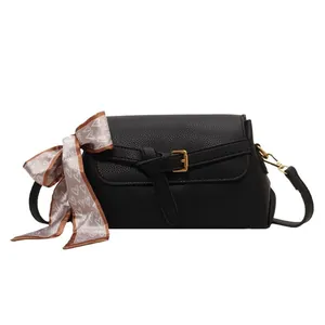 Classic black litchi texture crossbody bag with heart pattern scarf and gold buckle