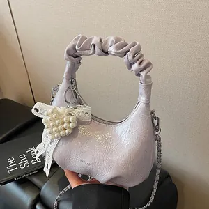Light purple pleated cloud bag with pearl heart charm and silver chain strap