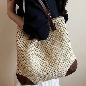 Large capacity straw woven tote bag with brown leather handles for summer beach vacations