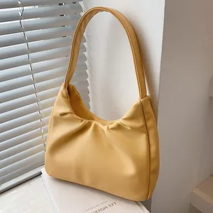 Chic ginger yellow pleated cloud shoulder bag with wide handle for women's daily fashion