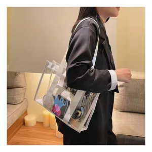 Detailed view of clear jelly tote bag showing interior capacity and white woven handles