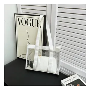 Detail of transparent PVC tote bag with white nylon webbing and inner pouch