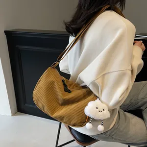 Minimalist ginger yellow corduroy half-moon crossbody bag with cute cloud charm