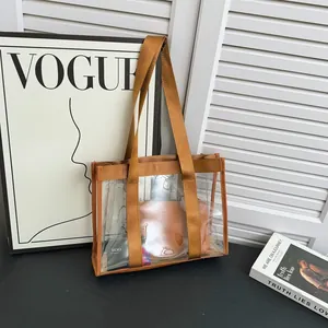Chic transparent PVC tote bag with brown nylon straps and large capacity for daily fashion