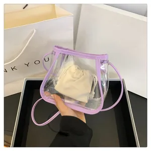 Detail of purple transparent PVC jelly bag featuring a cream drawstring inner pouch