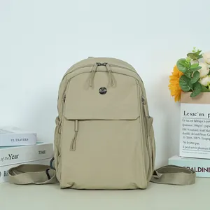 Minimalist beige outdoor backpack with large capacity and multi-pocket functional design