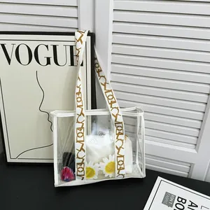 Minimalist clear PVC tote bag with stylish wide shoulder strap and white inner pouch