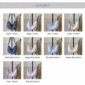 Detail display of vintage plaid crescent shoulder bags in five colors with strap options