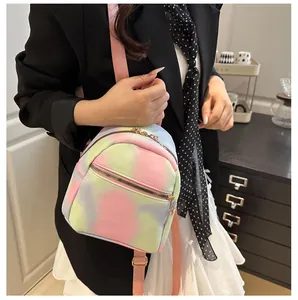Detail of colorful macaron tie-dye leather mini backpack with metal zipper and pink straps