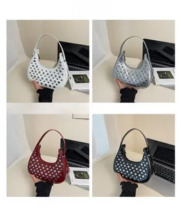 Four colors of stylish studded crescent hobo bags including white, silver, red and black