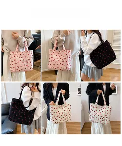 Collage of strawberry print corduroy tote bags shown in pink, black, and cream white