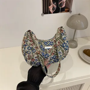 Floral pattern linen shoulder bag with vintage silver accent and slim strap