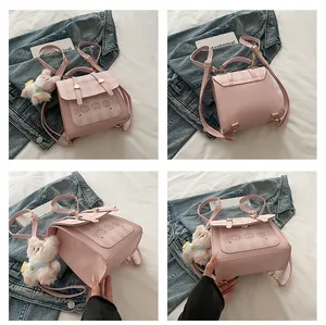 Pink checkered PU leather backpack with cute animal prints and plush dog charm detail