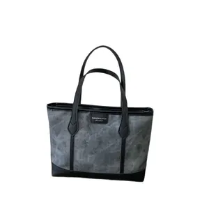 Vintage gray large capacity tote bag with black faux leather trim and fashion label