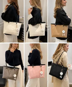 Detailed grid of textured tote bags in six colors with plush charms and shoulder straps