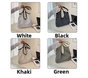 Polka dot tote bags displayed in white, black, khaki, and green color options