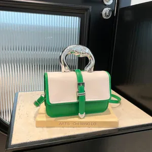 Modern white and green color-block handbag with artistic silver metal handle and strap