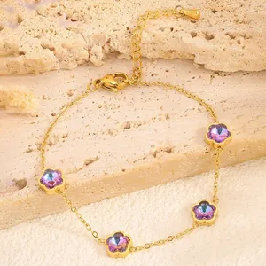 Bracelet trèfle plaqué or avec cristaux violets et fermoir mousqueton réglable