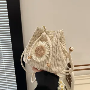 Straw beach bucket bag with large 3D sunflower and thick rope shoulder strap