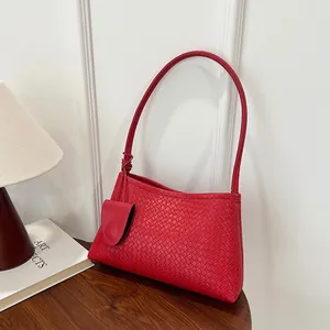 Red woven leather hobo shoulder bag with a matching mini pouch charm for women