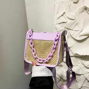 Woven straw and purple leather contrast small crossbody bag with plastic chain handle