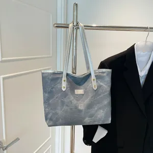 Retro grey tote bag with stone-wash texture and silver chain strap for women