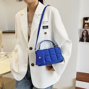 Royal blue quilted crossbody bag for women with matching envelope pouch and top handle