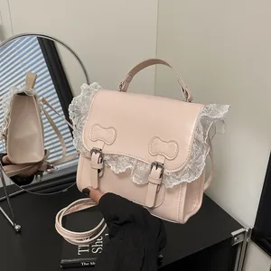 Chic light pink shoulder bag with delicate white lace trim and bow details in soft lighting