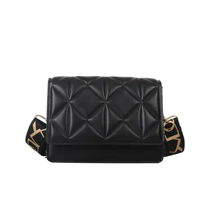 Quilted black crossbody bag with wide logo strap and elegant rhombus pattern texture