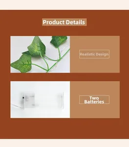 Detail of faux eucalyptus leaf string lights showing the battery box and realistic vein texture