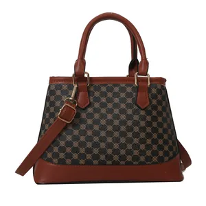 Retro checkered print crossbody bag in dark brown and caramel with gold hardware
