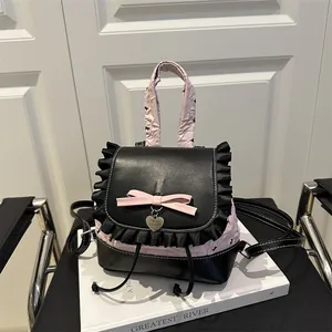 Schicker rosa Rüschen-Rucksack mit schwarzer Schleife und Herzanhänger für Mädchen