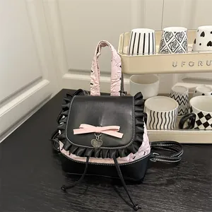 Mini-Lolitastil-Rucksack in Schwarz und Rosa mit Spitzenbesatz und Schleifendekor