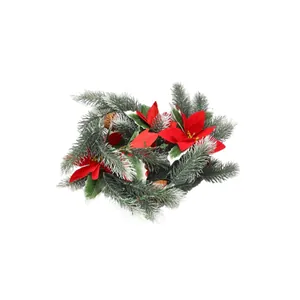 Artificial Christmas wreath with red poinsettia flowers and snowy pine needles