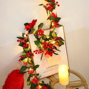 Christmas red berry garland with LED lights for festive holiday home decoration