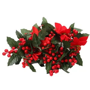 Artificial red berry garland with poinsettia flowers for Christmas holiday decoration