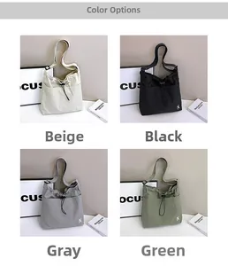 Detail view of nylon drawstring bags in beige, black, gray, and green color options