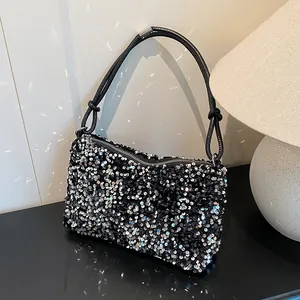 Sparkly sequin hobo shoulder bag with knot strap and silver accents for modern women