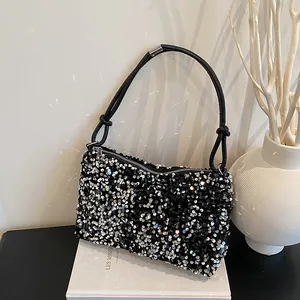 Chic black sequin shoulder bag for women with elegant knot detail on slim strap