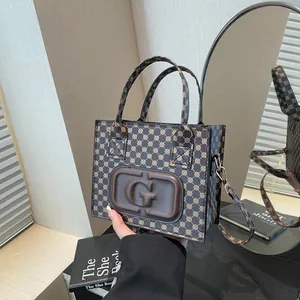 Classic retro square crossbody bag with vintage monogram and gold G hardware detail